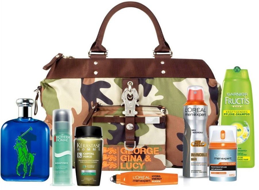George Gina & Lucy CamOrange / Bakerboy Tasche gefüllt mit Beauty-Produkten von Ralph Lauren, Biotherm, Kerastase, L'Oreal Men und Fructis George Gina & Lucy CamOrange / Bakerboy Tasche gefüllt mit Beauty-Produkten von Ralph Lauren, Biotherm, Kerastase, L'Oreal Men und Fructis